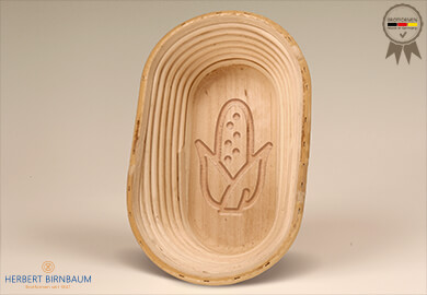 birnbaum gaerkoerbchen aus peddigrohr mit gravur mais